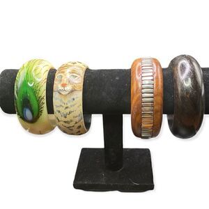 Set of 4 bracelets two wood one dark, one  metal inlay, wood leopard peacock